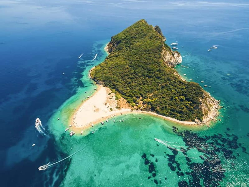 Half-Day Tour to Turtle Island - Keri Caves - Boarding the glass-bottom boat for Marathonisi