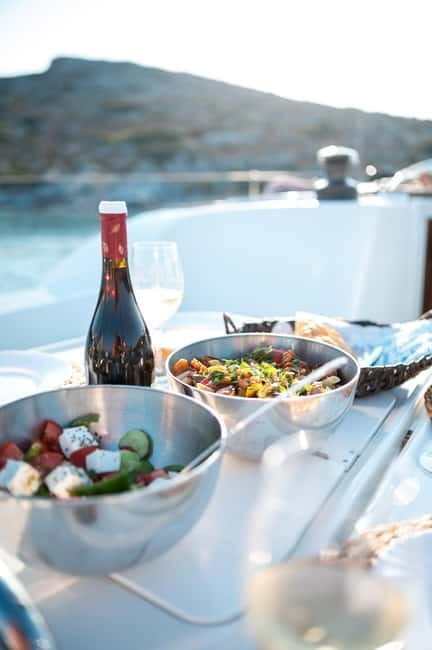 Heraklion: Dia Island Sunset Boat Tour with Dinner - Sunset sailing over the Aegean: why the timing matters