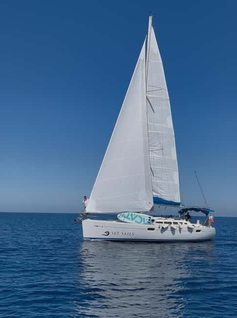 Heraklion: Sailing Trip to Dia Island with Lunch & Swimming - Sailing North on the Aegean: Views, Dolphins, and Crew Humor