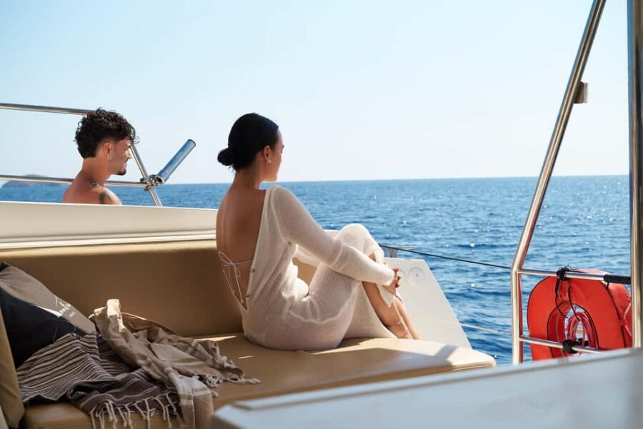 Hersonissos: Dia Catamaran Cruise with Lunch & Drinks - What you get for $170: space, food, and an open-bar rhythm