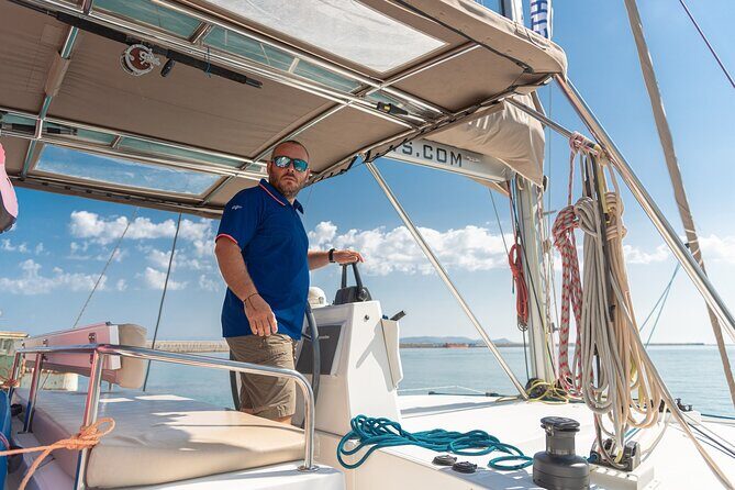 Hersonissos: Luxury Sunset Catamaran Cruise Sushi & Open Bar - The Agios Georgios Sarantáris stop: snorkeling, SUP, and the sunset payoff
