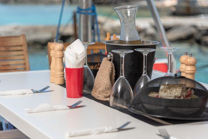 Hersonissos: Luxury Sunset Catamaran Cruise Sushi & Open Bar - Food rhythm and timing: when to snack and how late you’ll get back