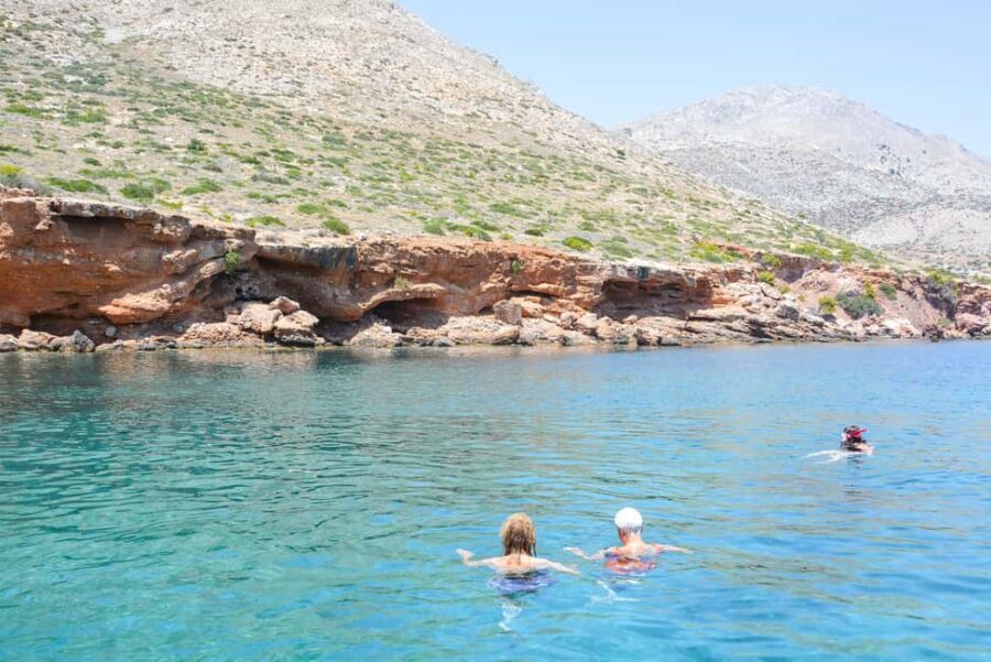 Hydra: Island Tour by Boat with Lunch - Nisiza lunch and deck rest with small-cave scenery