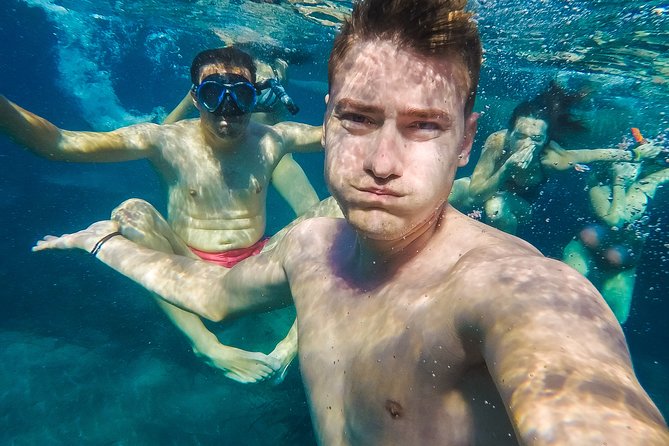 Island Hopping: Santorini Catamaran Charter Cruise with a skipper - Days three and four: swimming, snorkeling, and shore breaks