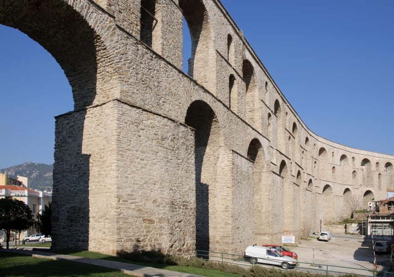 Kavala: Authentic City Tour by Eco Friendly Tuk Tuk - Tobacco warehouses: how Kavala grew beyond the seaside postcard