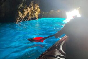 Kayak Trip to Hidden blue Cave, with lunch & fruits. - Swim and snorkel stops: starfish, red coral, and easy excitement