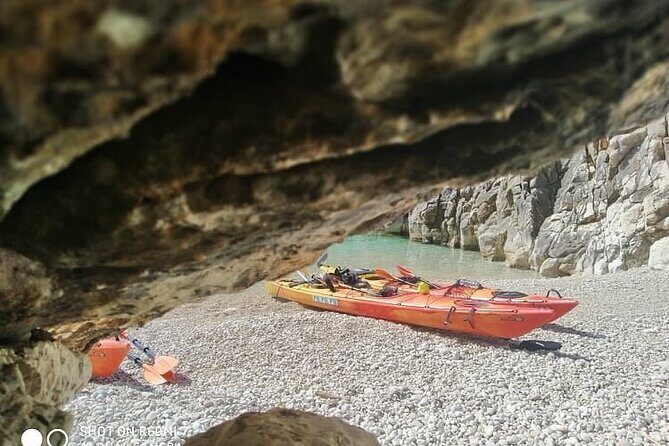 Kayak Trip to Hidden blue Cave, with lunch & fruits. - Guides and group energy: Yiannis (and the team style) keeps it fun