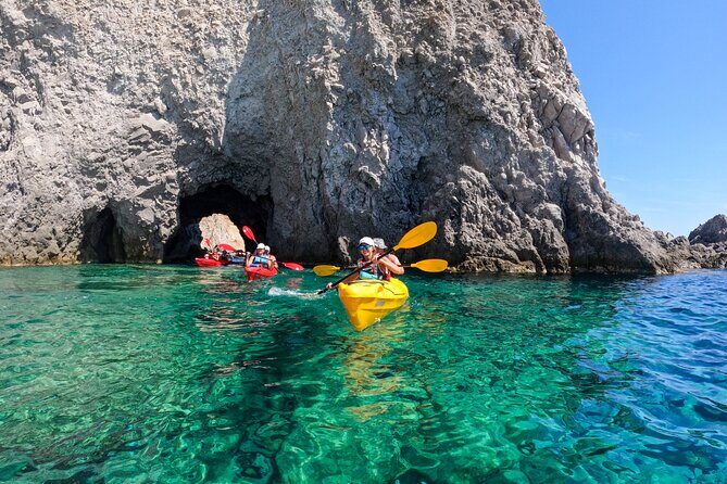Kayaking Tour to the secrets of Milos - Gerakas hot springs in the bay: warm water break during a water-heavy day
