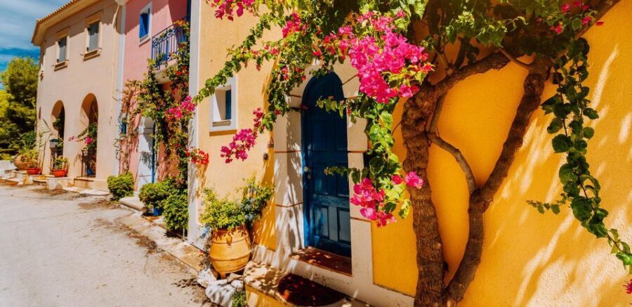 Kefalonia: Island Highlights Bus and Boat Tour with Lunch - Assos Village: Colorful Hillsides and Venetian Castle Ruins