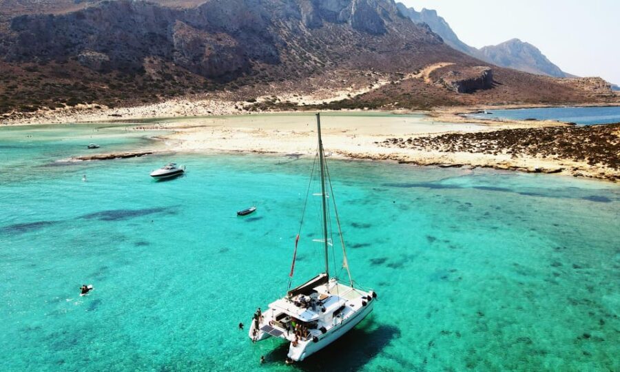 Kissamos: Balos & Gramvousa Luxury Catamaran Sailing Cruise - Balos Lagoon swim time: pink sand, shallow water, and toy options