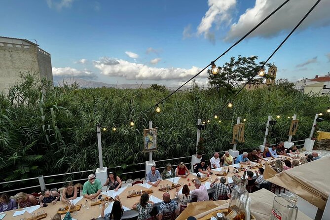 Kissamos: Greek Night Experience with Dancing and Buffet Dinner - Local beer and wine before dinner