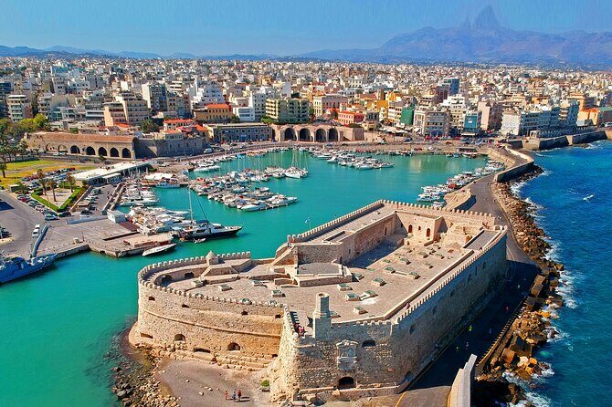Knossos & Heraklion Tour with Professional Certified Guide - Pickup, Van Comfort, and Group Size Reality