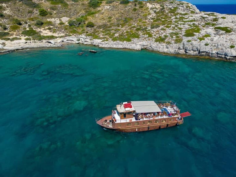 Kolympia : Transfer & Cruise to Lindos with 3 Swimming Stops - What the boat gives you: shade, toilets, floats, and the bar