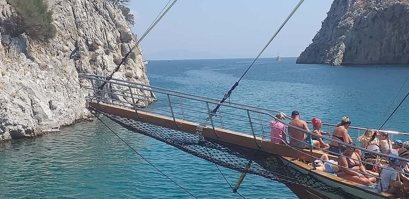 Kos: 3-Island Cruise with Lunch, Swimming and Audio Guide - Dolphin watching: fun when it happens, still a good sea day