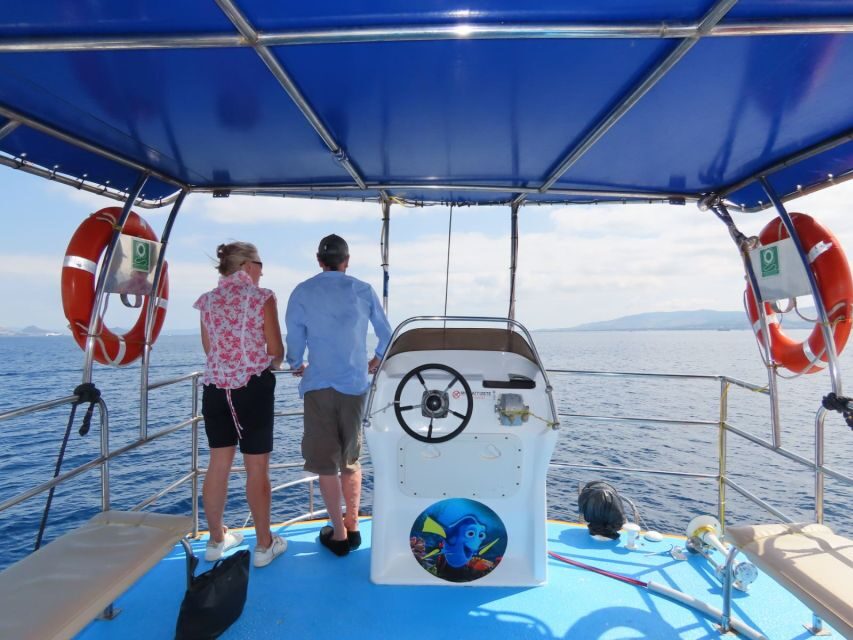 Kos Town: Glass-Bottom Boat Cruise with Swimming Stops - Onboard snacks, drinks, and toilets: what the 150 minutes really includes