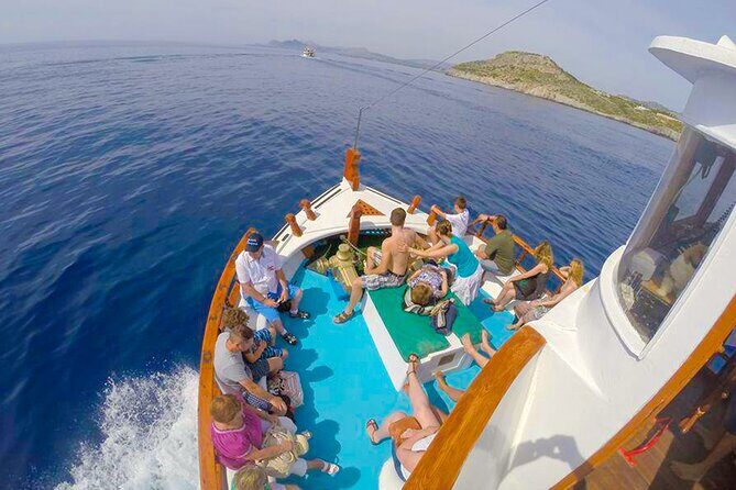 Lindos Boat Cruise from Faliraki & Kalithea with Swim Stops - Anthony Quinn Bay: famous sand and another 30-minute break