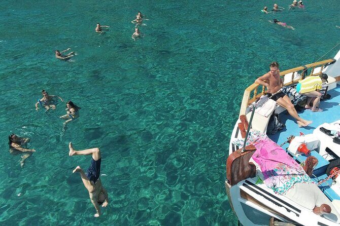 Lindos Boat Cruise from Faliraki & Kalithea with Swim Stops - When the day gets tricky: rain, crowding, and steep walking