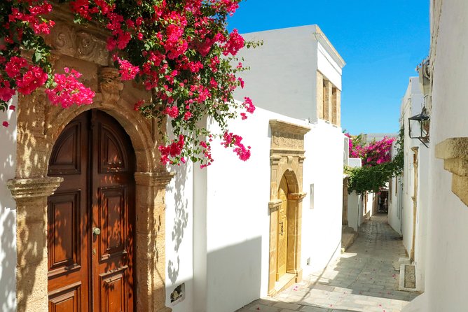 Lindos Day Cruise from Rhodes Town with Swimming stops and Hotel Transfers - Who will enjoy this Lindos cruise