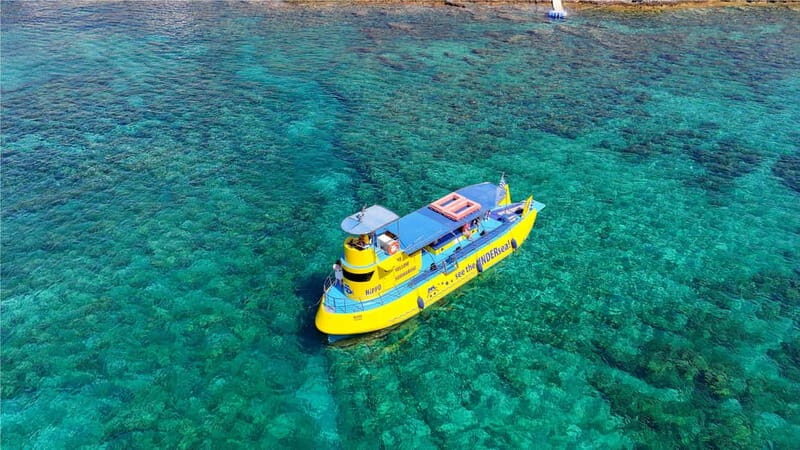 Lindos: Submarine Cruise with Swimming Stop at Navarone Bay - Onboard comfort and value extras: AC, WiFi, and the included drink