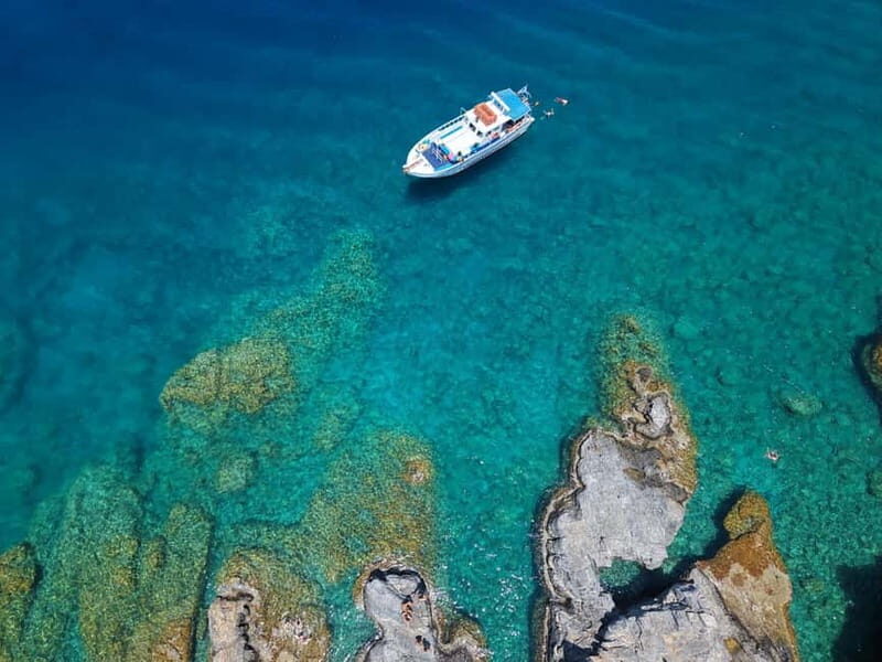 Lindos: Sunset Cruise with Unlimited Aperol, Beers & Wine - Snorkelling and Sea Caves: When the Cruise Turns Interactive