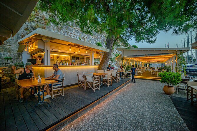 Live Jazz Music and Local Stories in the Heart of Corfu - The harbor-side terrace at Corfu Sailing Restaurant