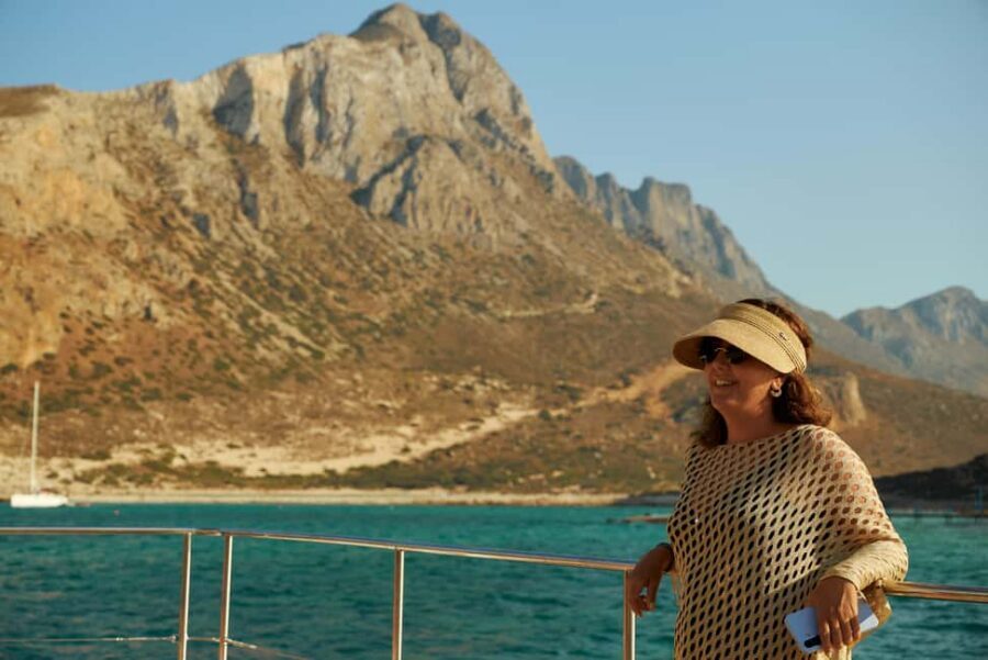 Luxury Catamaran to Balos: Sunset, Snacks, Drinks & Transfer - Balos Lagoon Stop: Beach Time, Tender Drop-Off, and Included Water Fun