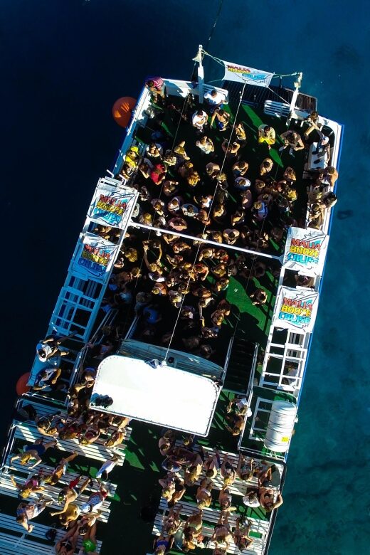 Malia: Booze Cruise Boat Party with Live Dj - Swim Stops in a Shelter Bay: What to Pack and When It Works