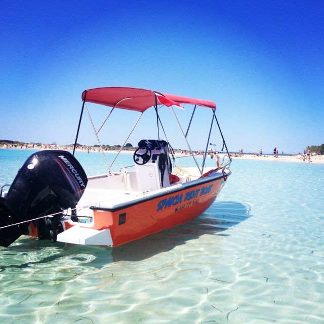 Marathi: Private Boat Rental - Taking the helm at Marathi Bay