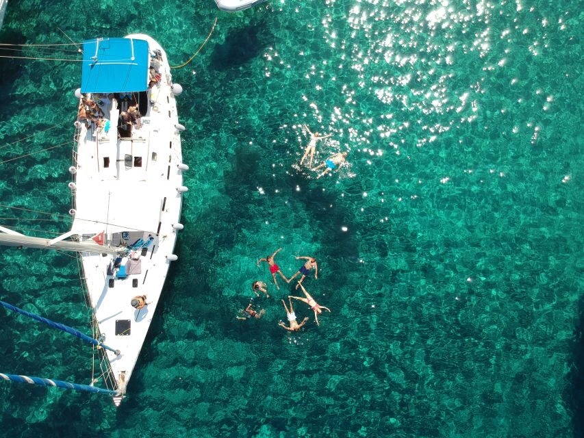 Milos: Milos and Polyaigos Snorkeling and SUP Cruise - Starting in Adamas: what the morning looks like, and what you should bring