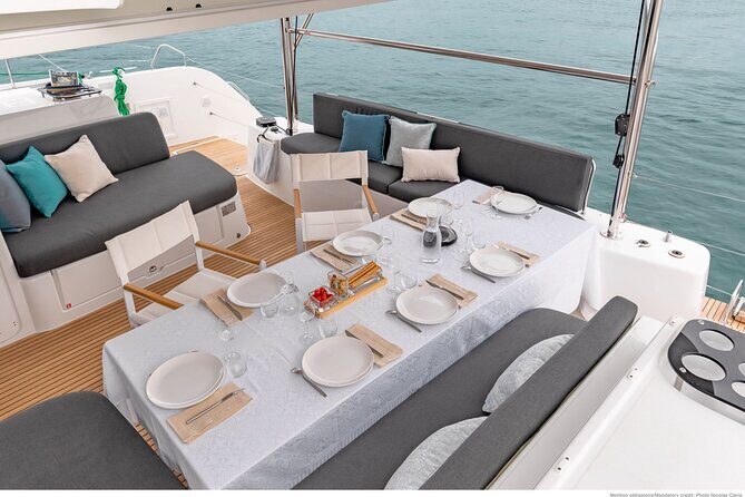 Milos & Poliegos Catamaran Cruise Homemade Full menu BBQ & Drinks - Cape Vani and Theiorychia: start with geology and sulfur mining clues