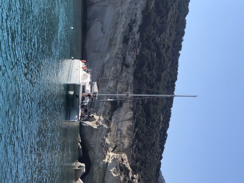 Milos: Sunset Catamaran Cruise with Kleftiko Visit - Kleftiko sea caves: what you actually get (and what to watch for)