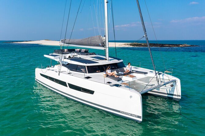 Mykonos: Brand-New Catamaran Cruise with Meal, Drinks & Transport - Rhenia Stop: Swimming, Snorkeling, and the Best Kind of Relax