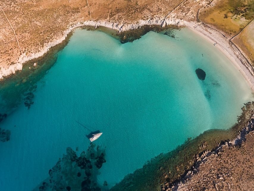 Mykonos: Catamaran Cruise with Lunch, Drinks and Transfer - Delos from the sea: what you’ll see (and what you won’t)