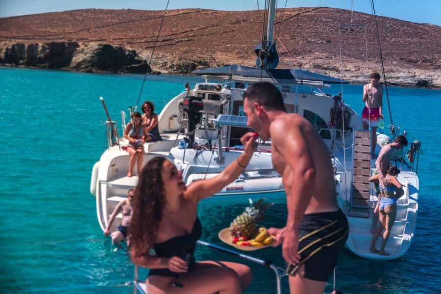 Mykonos: Catamaran Cruise with Lunch, Drinks and Transfer - The sailing experience: catamaran comfort and the music factor