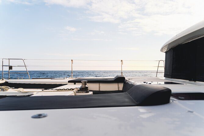 Mykonos Catamaran Sunset Cruise with Meal, Drinks & Transfer - Onboard life: drinks, WiFi, snorkeling gear, and water toys