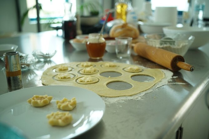 Mykonos Cooking Class of Local Specialties - Finishing with rafiolia, honey, and cinnamon