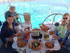 Mykonos: Delos and Rhenia Cruise with Swim and Greek Meal - Delos UNESCO: Short Stop, Big Stories, Great Sightlines
