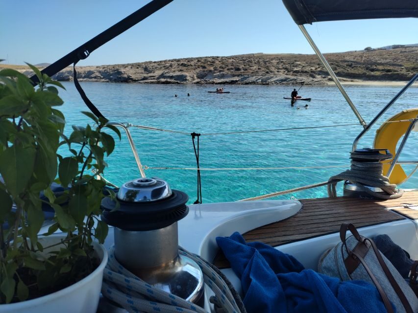 Mykonos: Delos and Rhenia Cruise with Swim and Greek Meal - Greek Lunch, Rosé and White Wine: Food That Changes the Mood