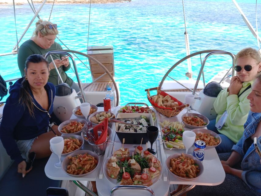 Mykonos: Delos and Rhenia Cruise with Swim and Greek Meal - Delos UNESCO: Short Stop, Big Stories, Great Sightlines