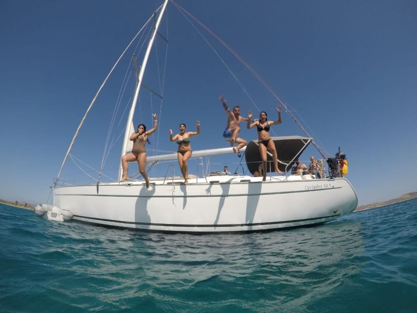 Mykonos: Delos & Rhenia Boat Cruise with Lunch & Transfer - Delos: Apollo and Artemis in about 75 minutes