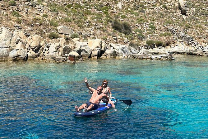 Mykonos Delos Rhenia Daily Cruise with BBQ, Drinks & Transfer - Rhenia Island: Anchored Beach Time, Snorkeling Gear, and Toy-Filled Water Fun