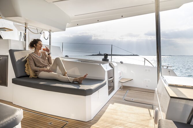 Mykonos: Luxury Catamaran Cruise with Meal, Drinks & Transport - Seeing Delos without stopping