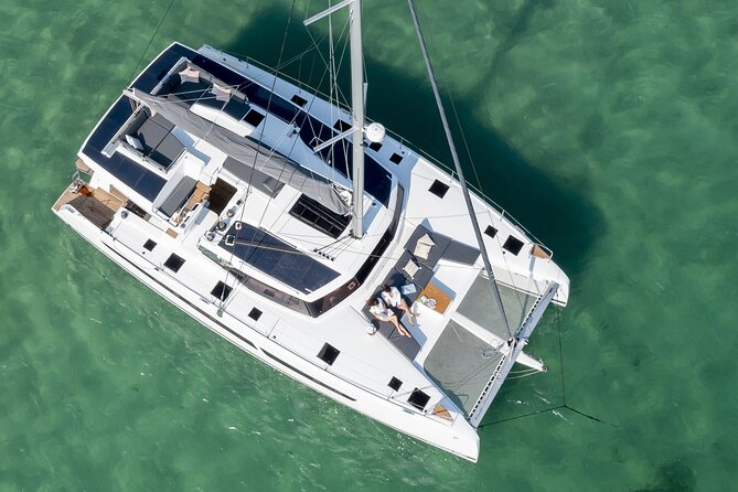 Mykonos: Luxury Catamaran Cruise with Meal, Drinks & Transport - Rhenia: the main swimming stop
