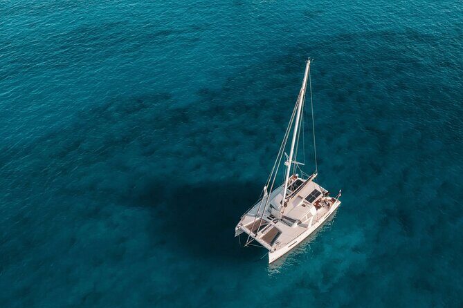 Mykonos: Private Catamaran Cruise—Hotel Pickup, BBQ & Drinks - Private Catamaran Feel on Your Own Mykonos Schedule