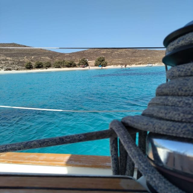 Mykonos: Rhenia Island Sunset Cruise with Transfer and Meal - Rhenia Island: Swimming, Snorkeling, and Paddleboarding (The Main Event)