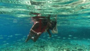 Mykonos: Secluded Bays Sea Kayaking Tour with GoPro Photos - The paddle to Agios Sostis: clear water and calmer landings