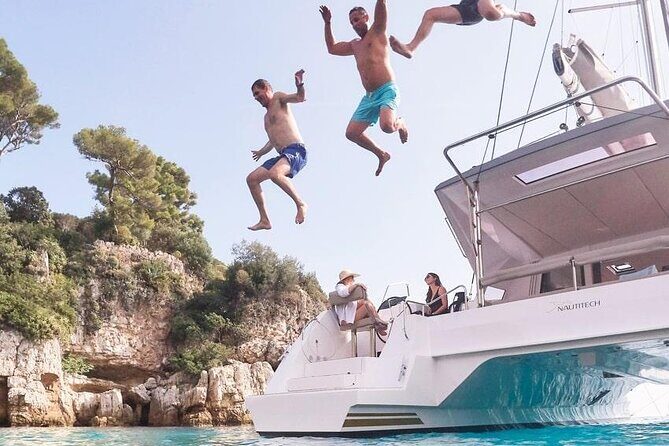 Mykonos Shared Catamaran Tour Experience - Delos ruins stop: mythology and real context from the crew