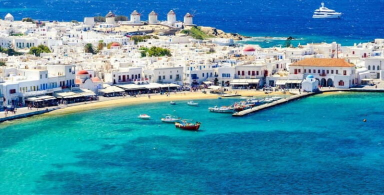 Mykonos: Small-Group Guided Highlights Shore Excursion - Port Pickup and the Air-Conditioned Minibus Advantage