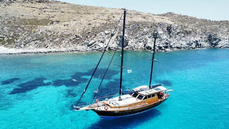 Mykonos: Sunset Boat Cruise with Light Dinner & Drinks - Dinner on Deck: Fish, Vegetables, and That Unhurried BBQ Feel