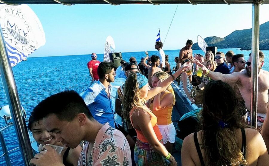 Mykonos: Sunset Boat Party with Open Bar & Live DJ - Swim Stops in the Aegean: Inflatables and a Jumping Board